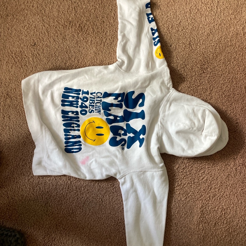 White Six Flags Hoodie with Blue and Yellow Print